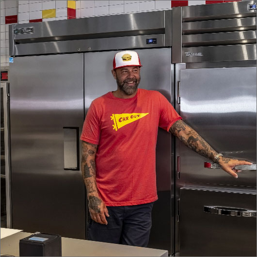 Chicken Out - Person Posing in Front of Fridge