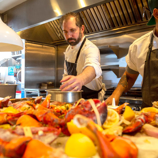 Little Fox - Chef Cooking over Pot in Kitchen