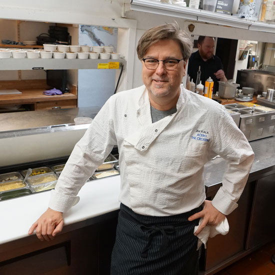 The Crossing - Person in Restaurant Kitchen